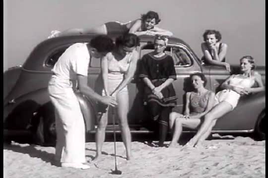 Chevrolet Leader News excerpt 1937. Golfer performs tricks with bathing beauties around a 1937 Chevr