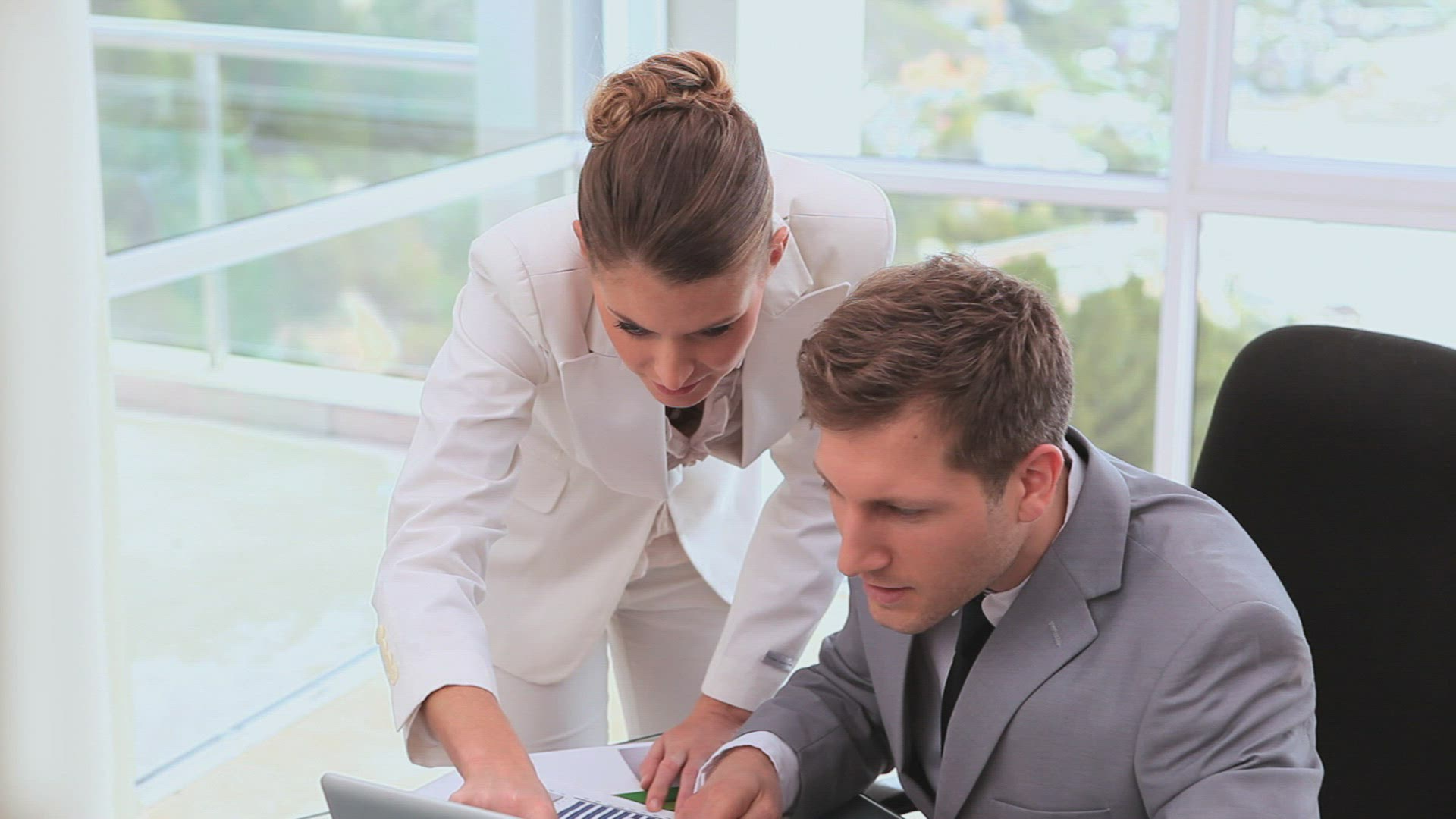 721228324 / Conversing / Businesswoman / Discussing