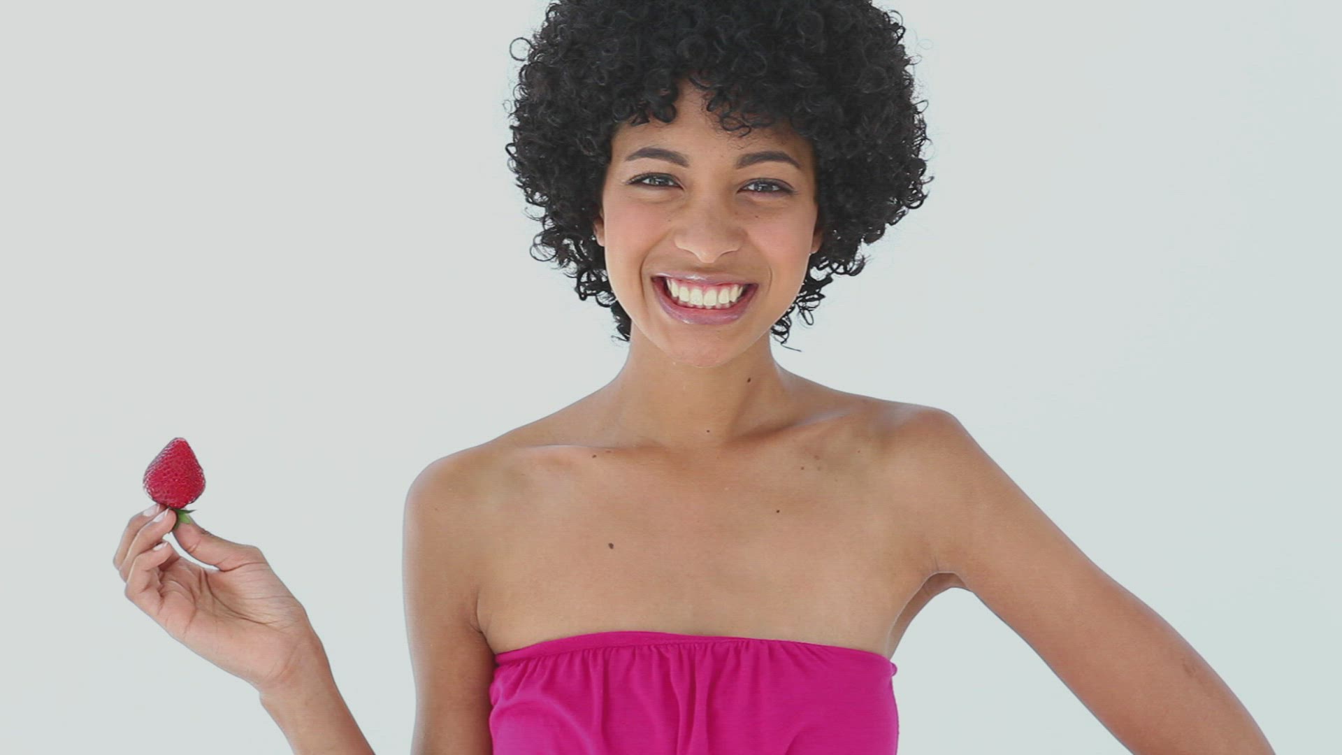 958733932 / Woman / Multi-Ethnic People / Strawberry / Looking