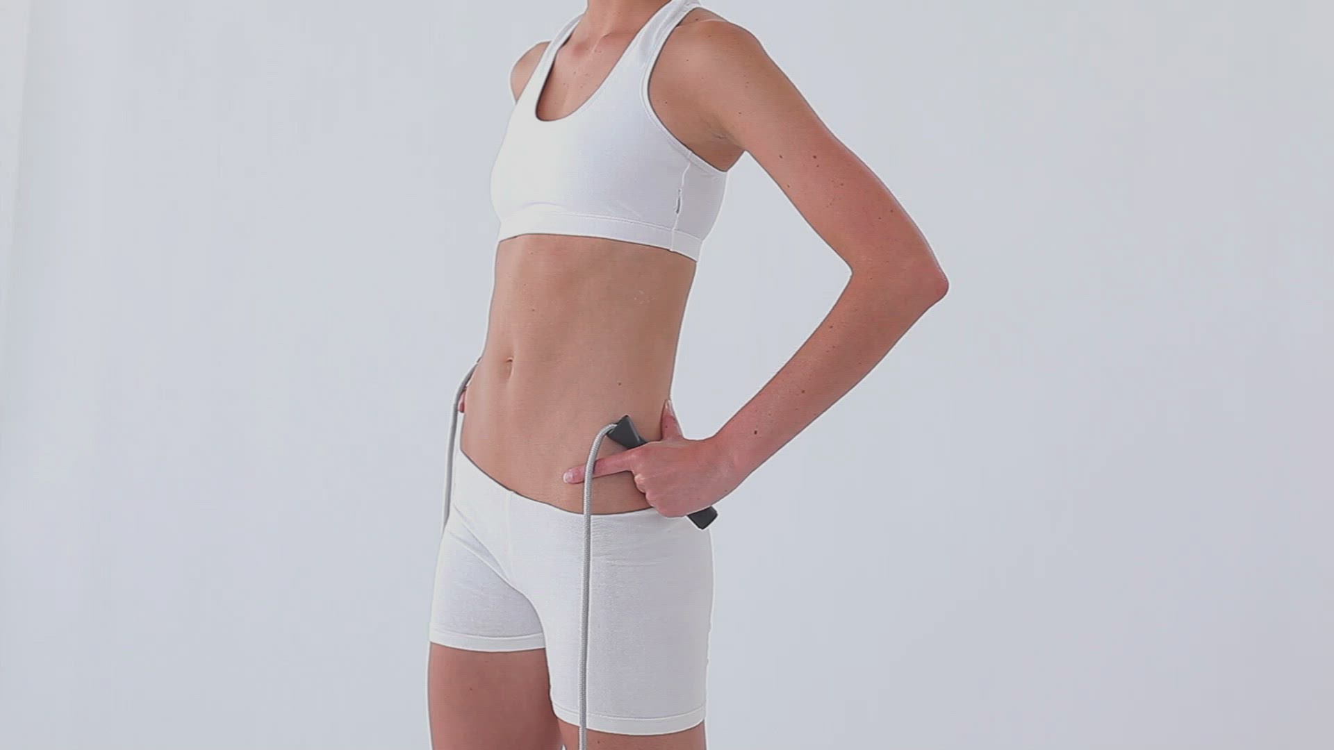 317058735 / Woman / Skipping Rope / Holding