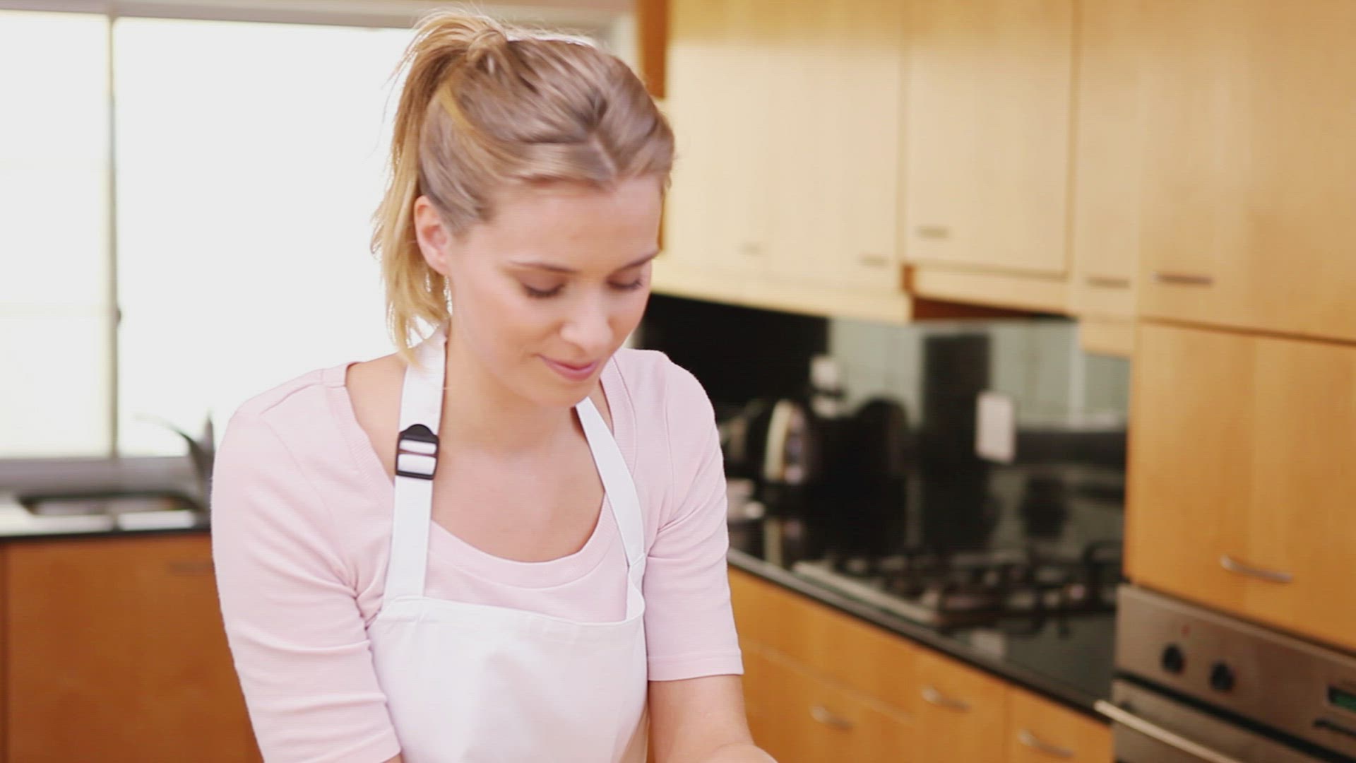 309799175 / Cooking / Putting / Preparing Food