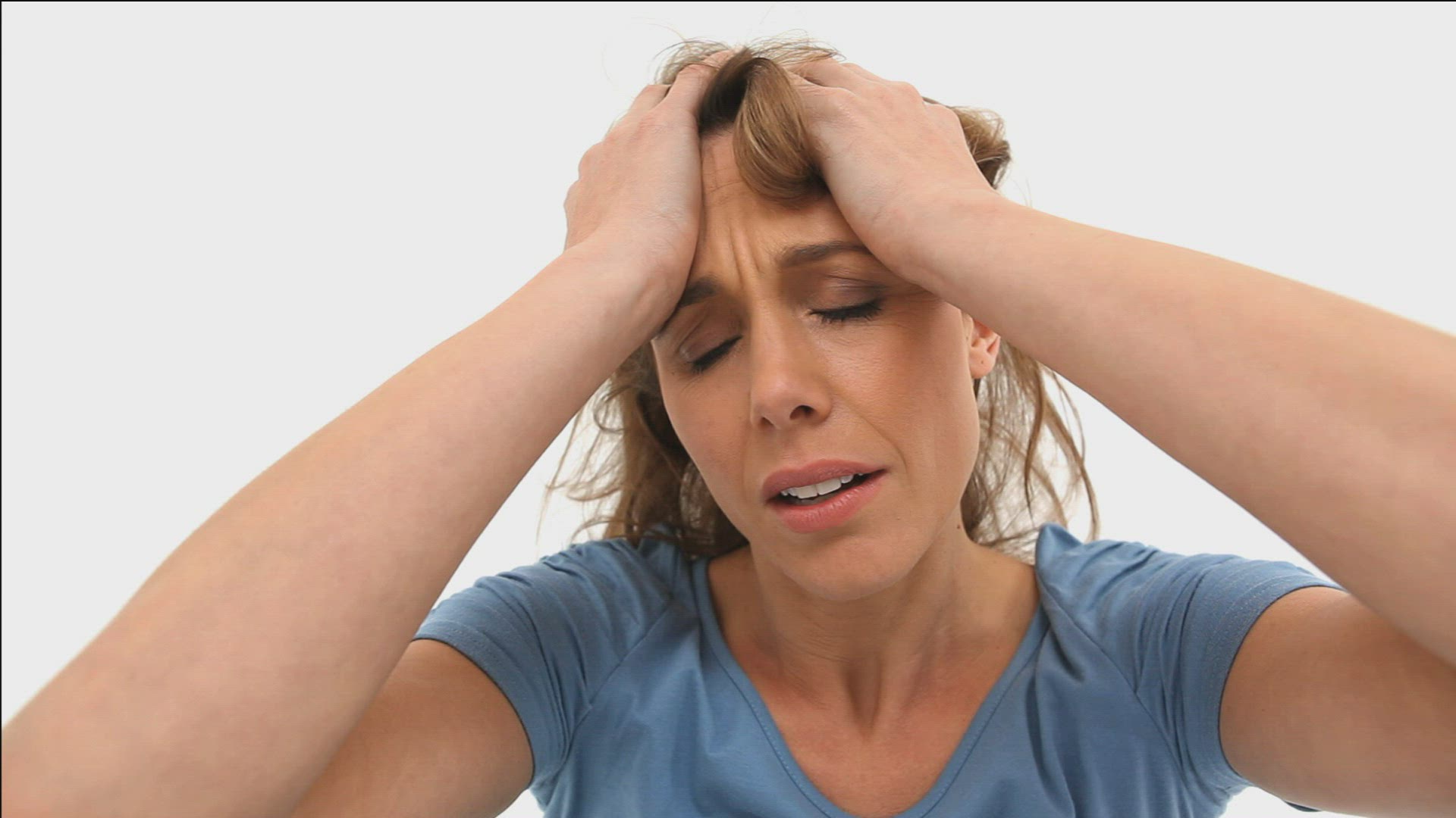 166001261 / Woman / Frustration / Tearing Hair Out