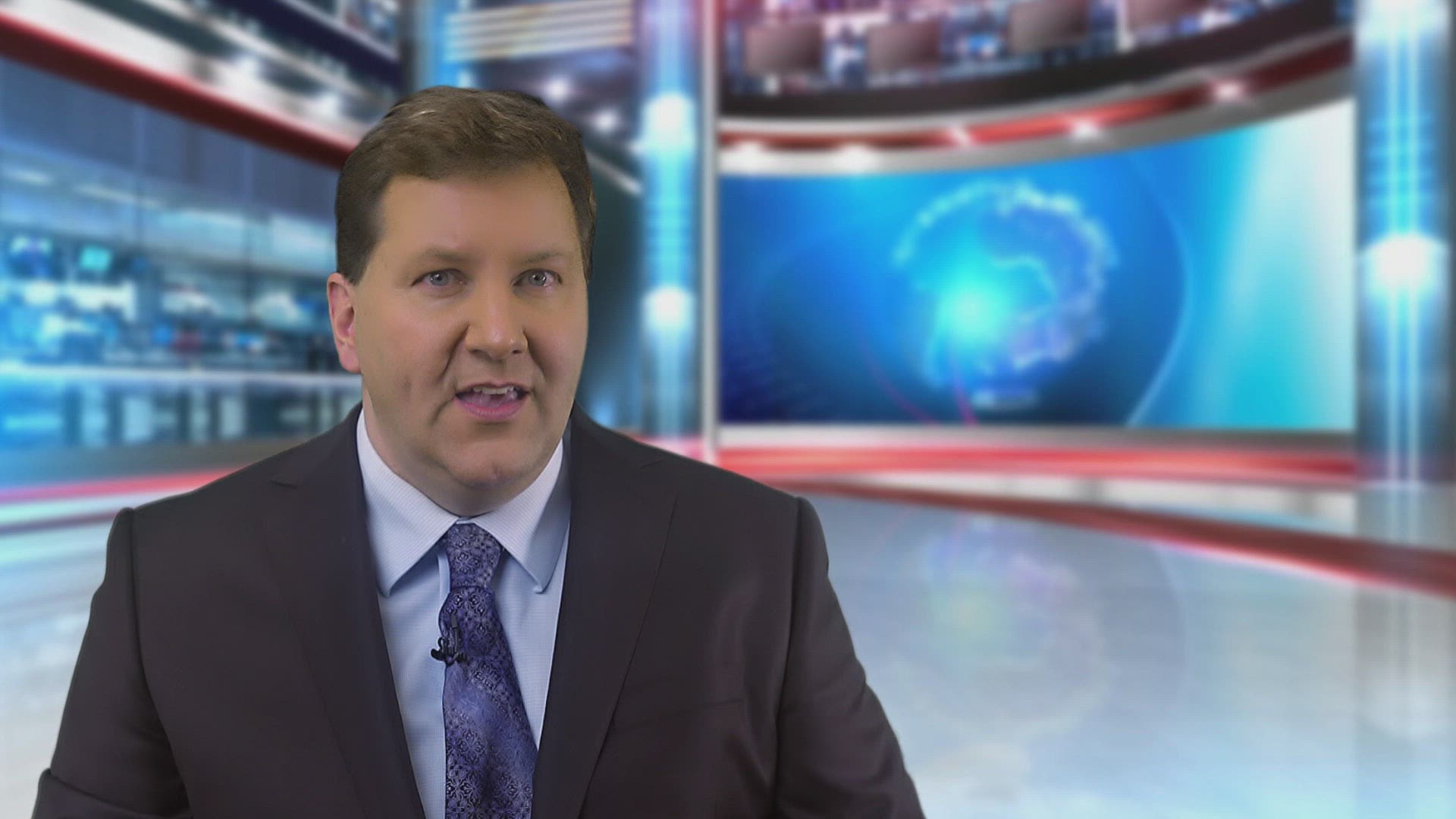 677208297 / Newsreader / Television Studio