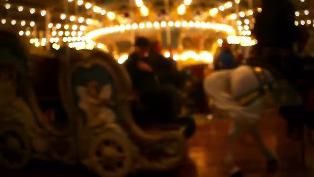 A merry go round is operational at night