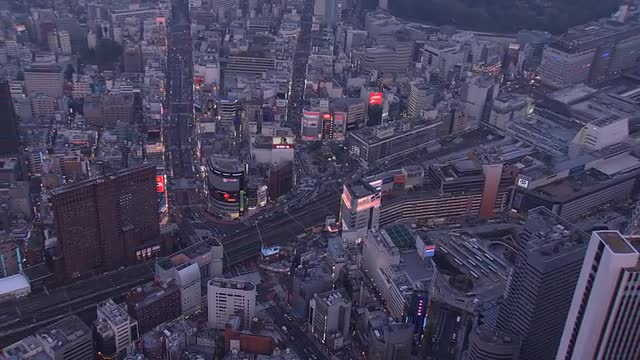 Aerial illuminated Shinjuku downtown Rail Track Tokyo Japan