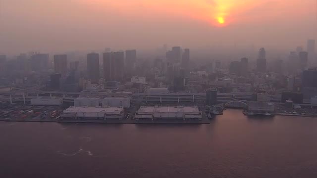 Aerial sunset Tokyo Bay Shuto Expressway Rainbow Bridge structure Japan 
