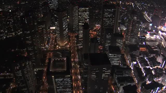 Aerial Metropolis Tokyo illuminated skyscrapers transport Financial District Japan