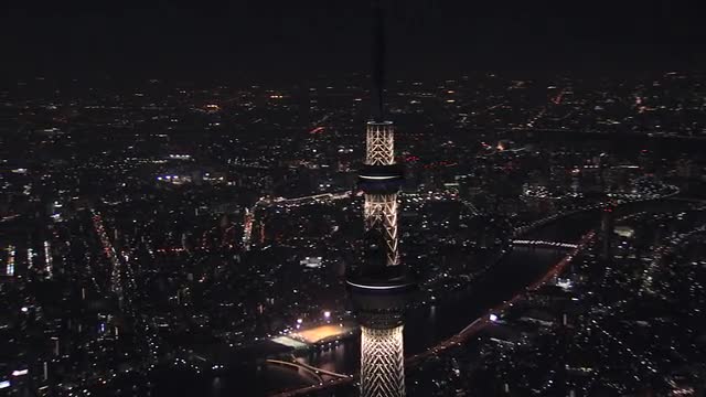 Aerial illuminated Skytree Tower cityscape Sumida district Tokyo Japan