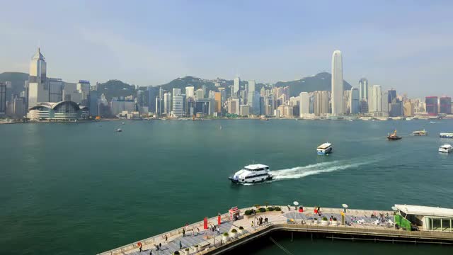 Time Hong Kong Promenade illuminated Victoria Harbour China
