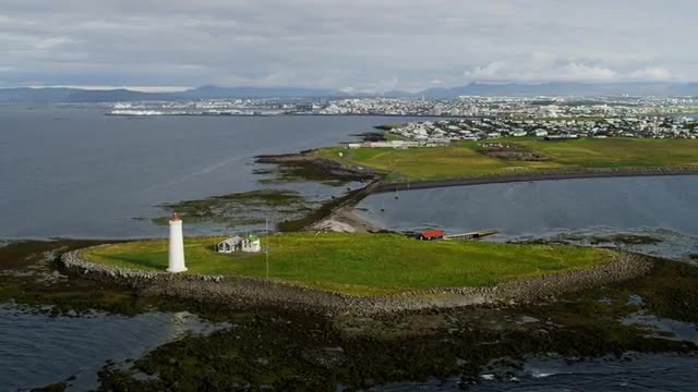 Aerial natural coastline bays Grotta lighthouse harbor  Reykjavik Iceland