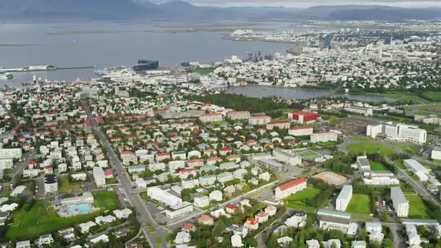 Aerial buildings roads Reykjavik Iceland capitol city homes suburbs 