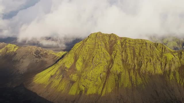 Aerial Icelandic region Iceland highlands volcanic area rocky peaks green