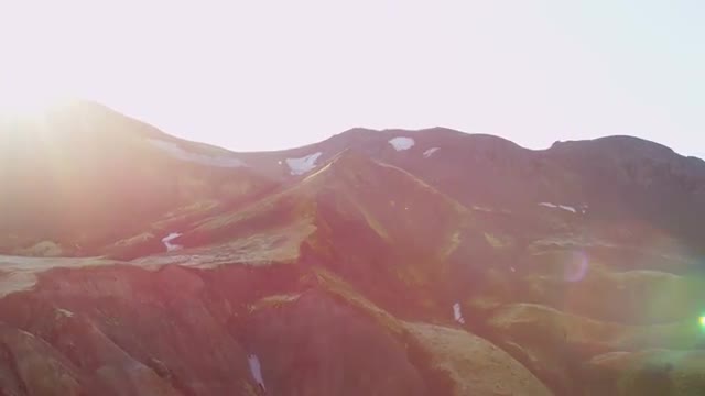Aerial volcanic area sun flare Landmannalaugar travel Iceland 