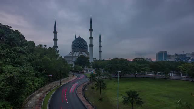 Night to Day Sunrise Time Lapse at a Mosque with car light trails