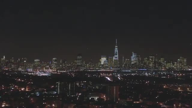 WIDE AERIAL VIEW PAN to Freedom Tower 
