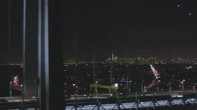 CLOSE UP of the Verrazano Bridge to WIDE AERIAL of NYC Skyline 