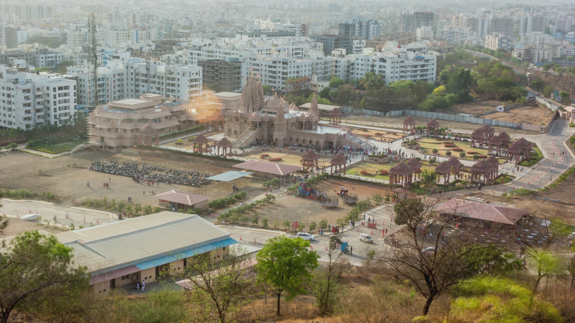 Time lapse of People Visiting Temple and Cityscape View from a Near by Hill