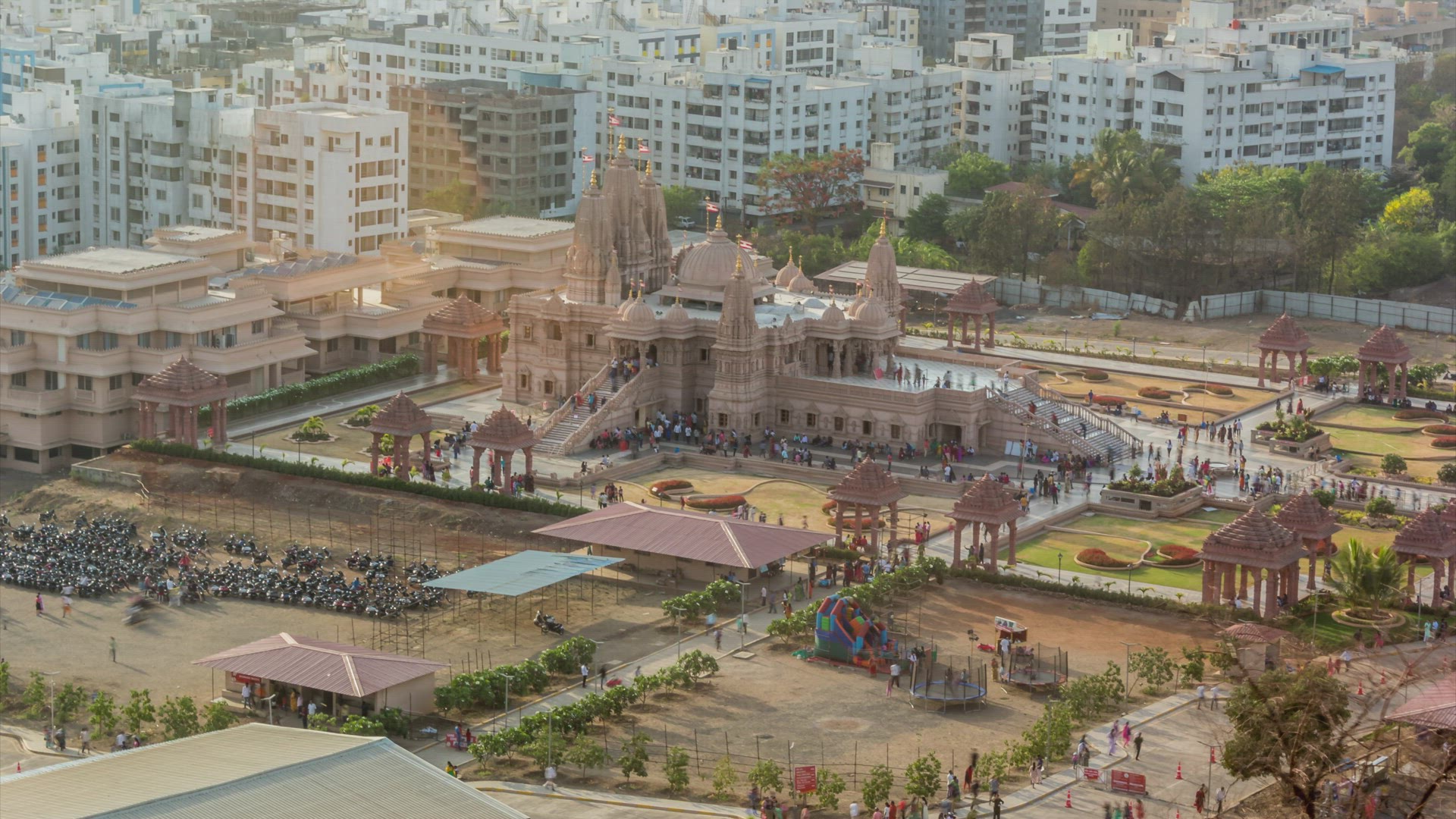 Time lapse of People Visiting Temple and Cityscape View from a Near by Hill