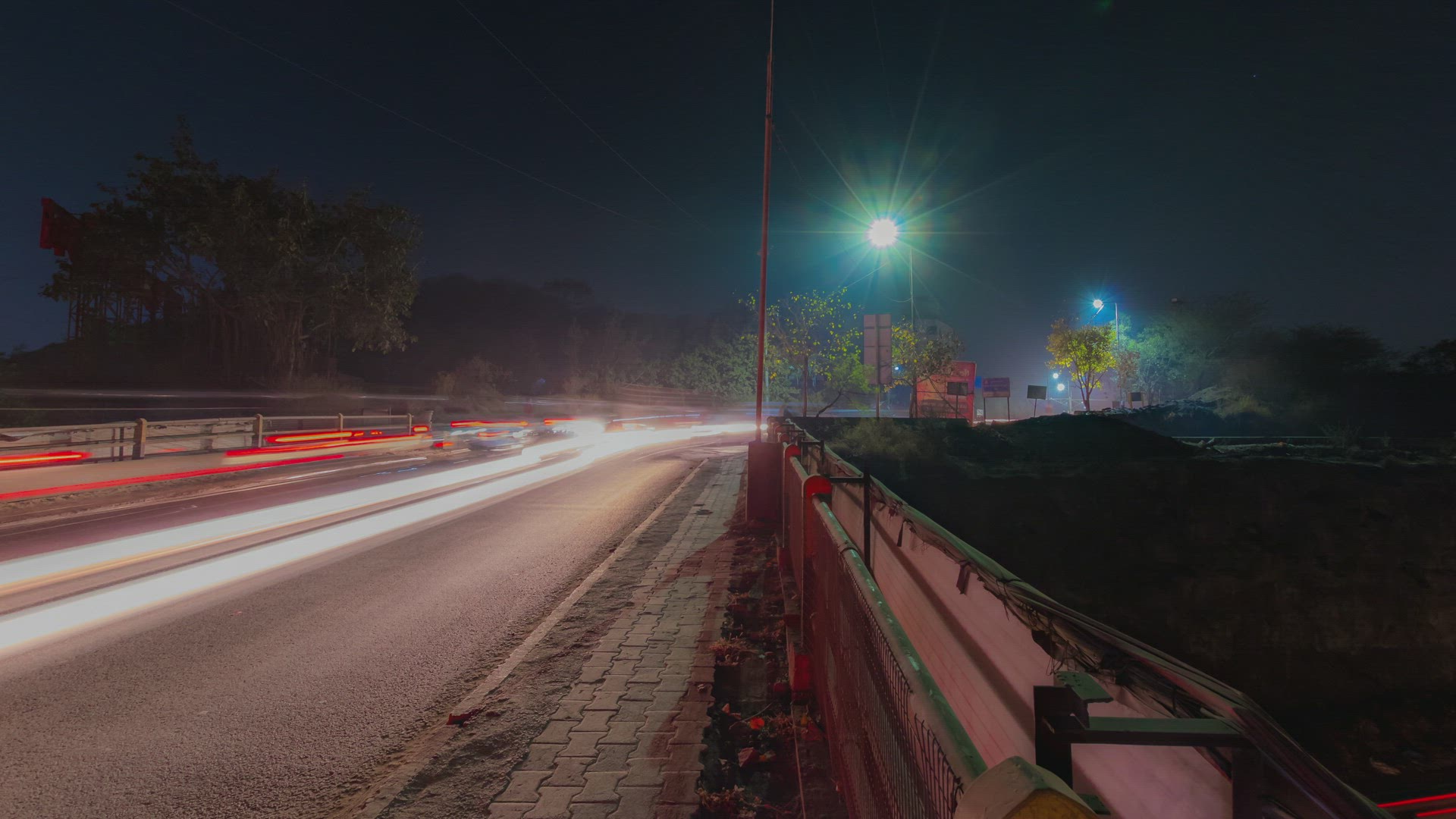 Panning Motion Time Lapse of Busy Traffic on Mumbai - Pune National Highway