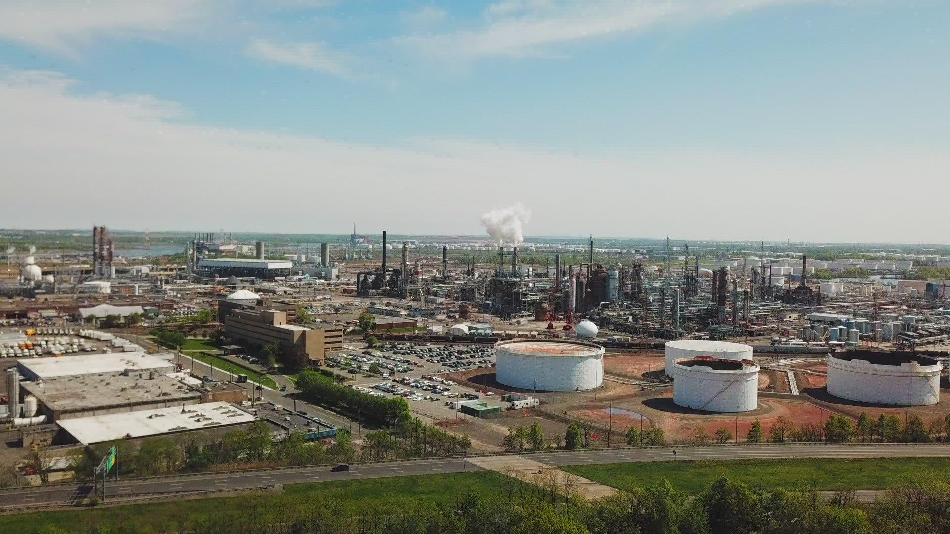 Arc Shot of Oil Refinery - Right to Left