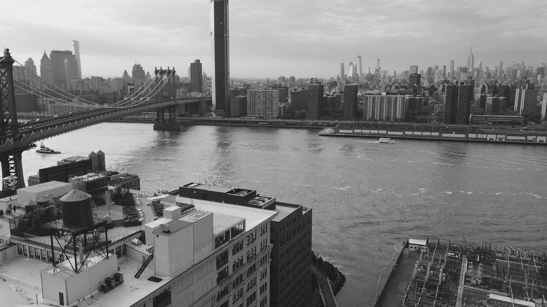 View of the East River, Manhattan Bridge and New York City in Black and White