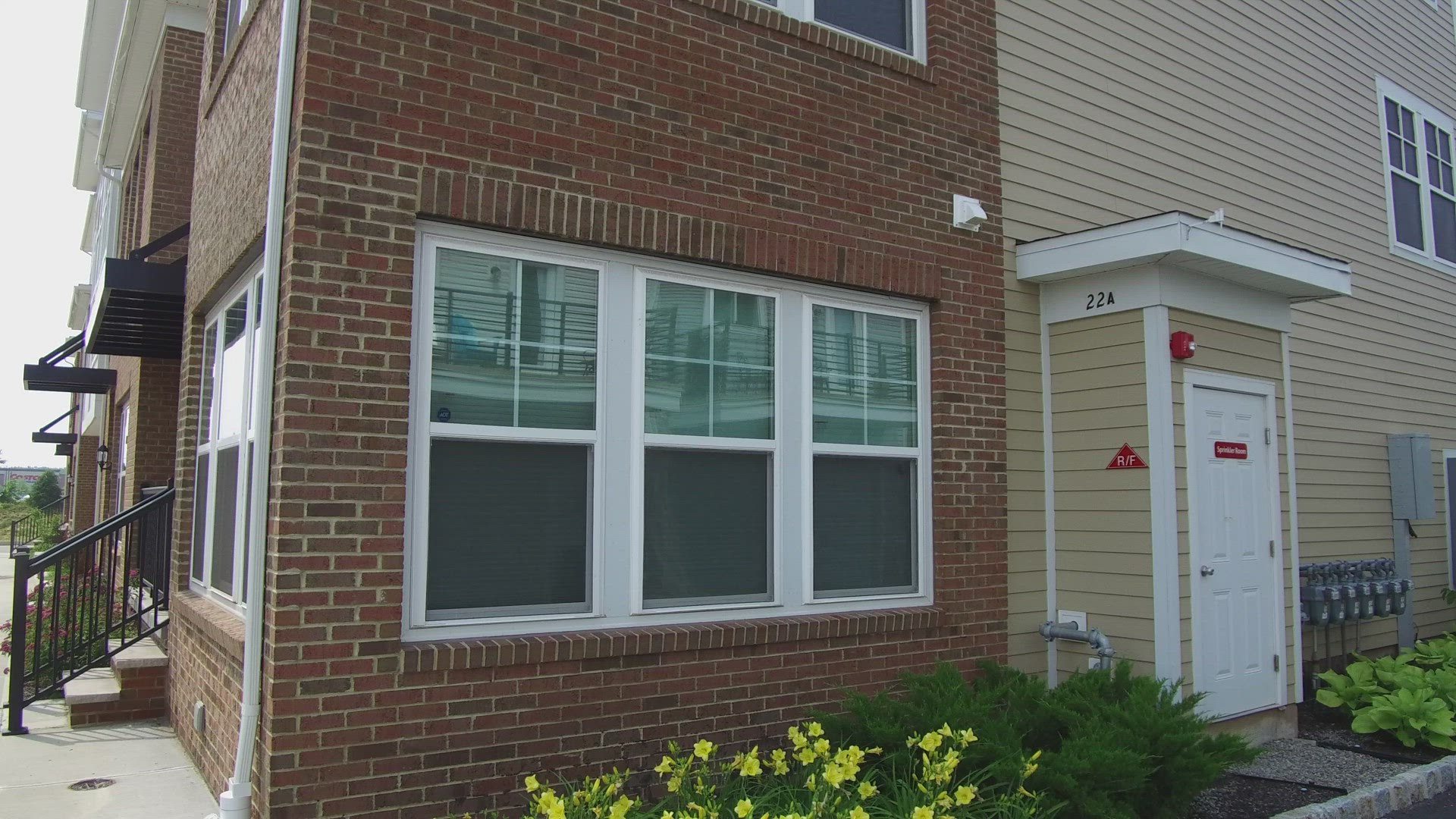 View of New Construction Townhome Garages - Pan Right