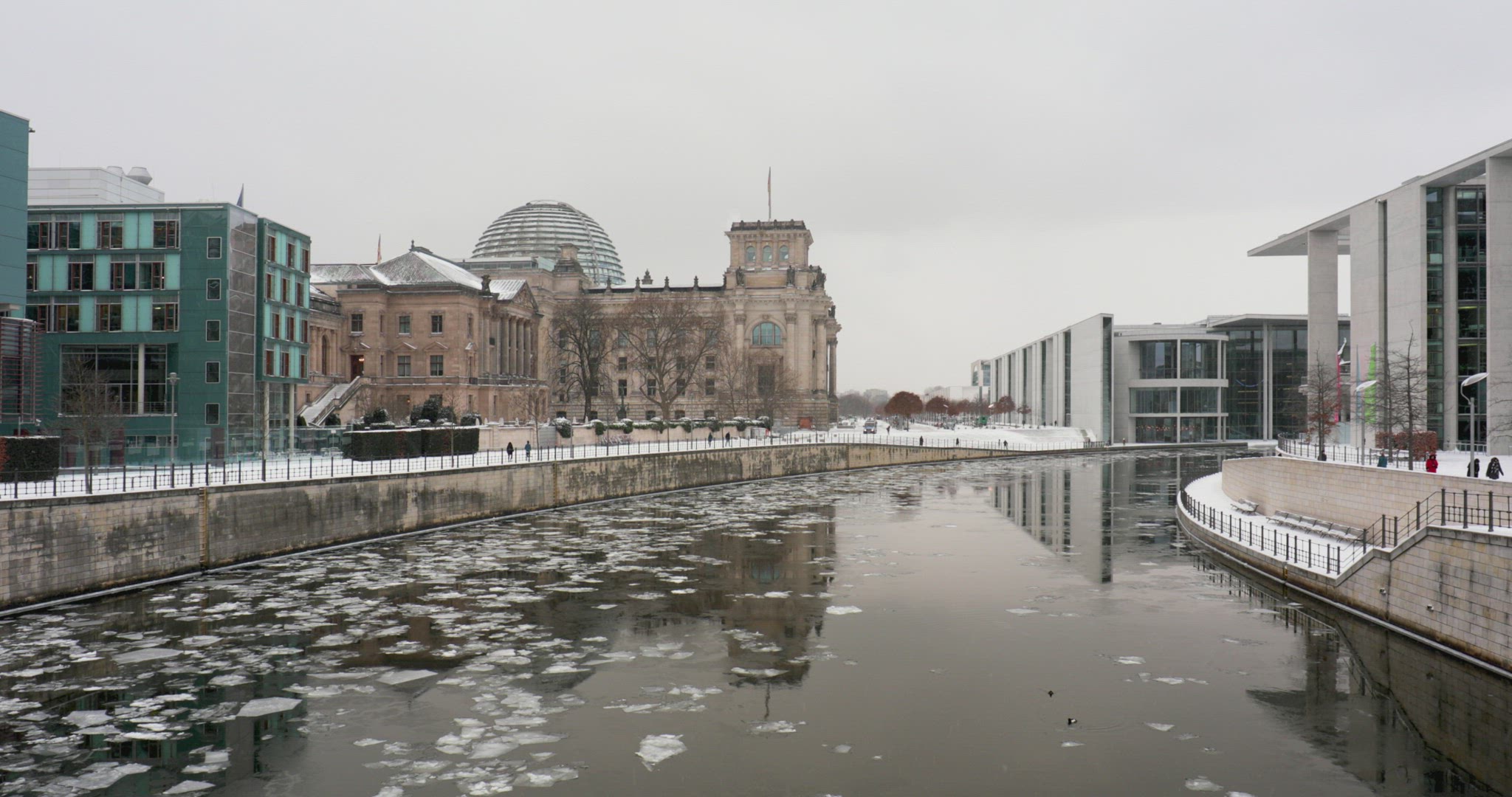 Spree river view in the wintertime with snow and ice ind Berlin, Germany