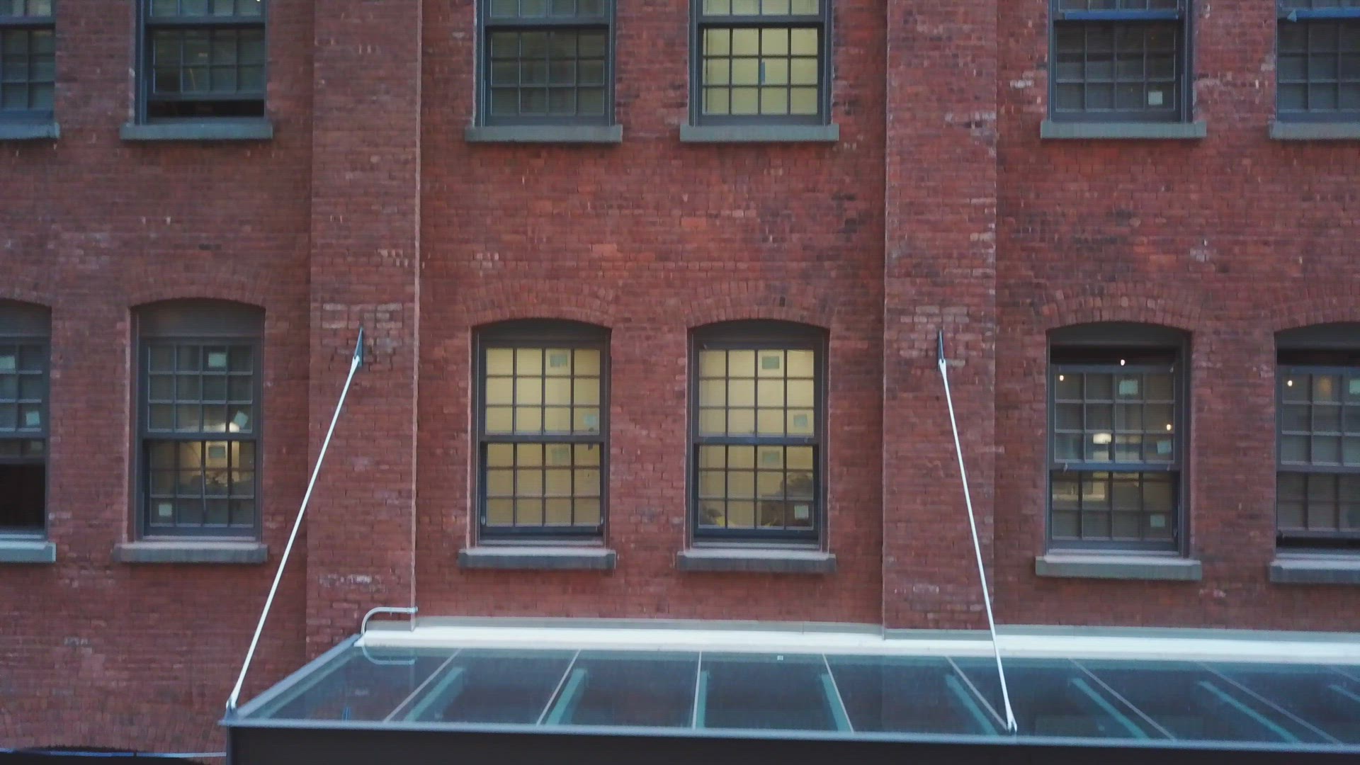 Close Up Crane Shot of a Brick Building in Brooklyn