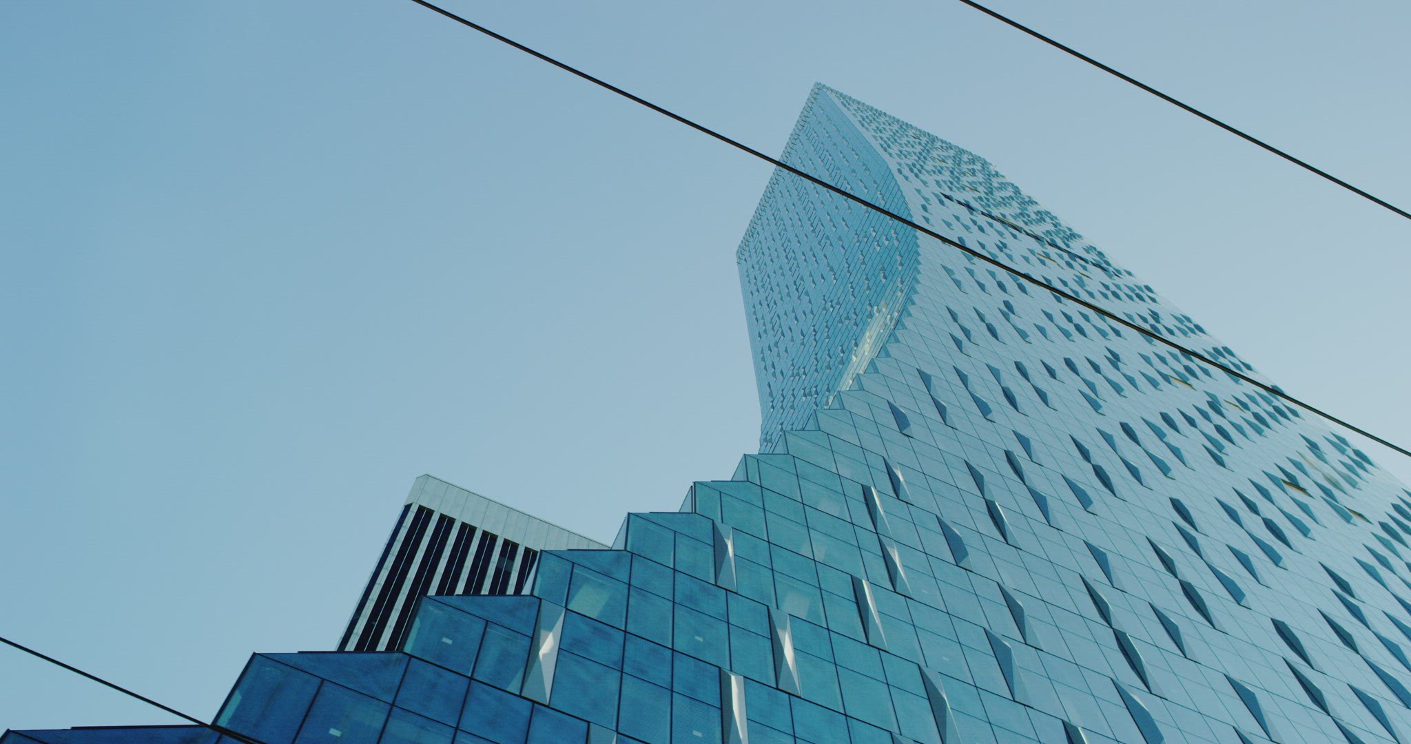Driving shot of Rainier Tower in Seattle
