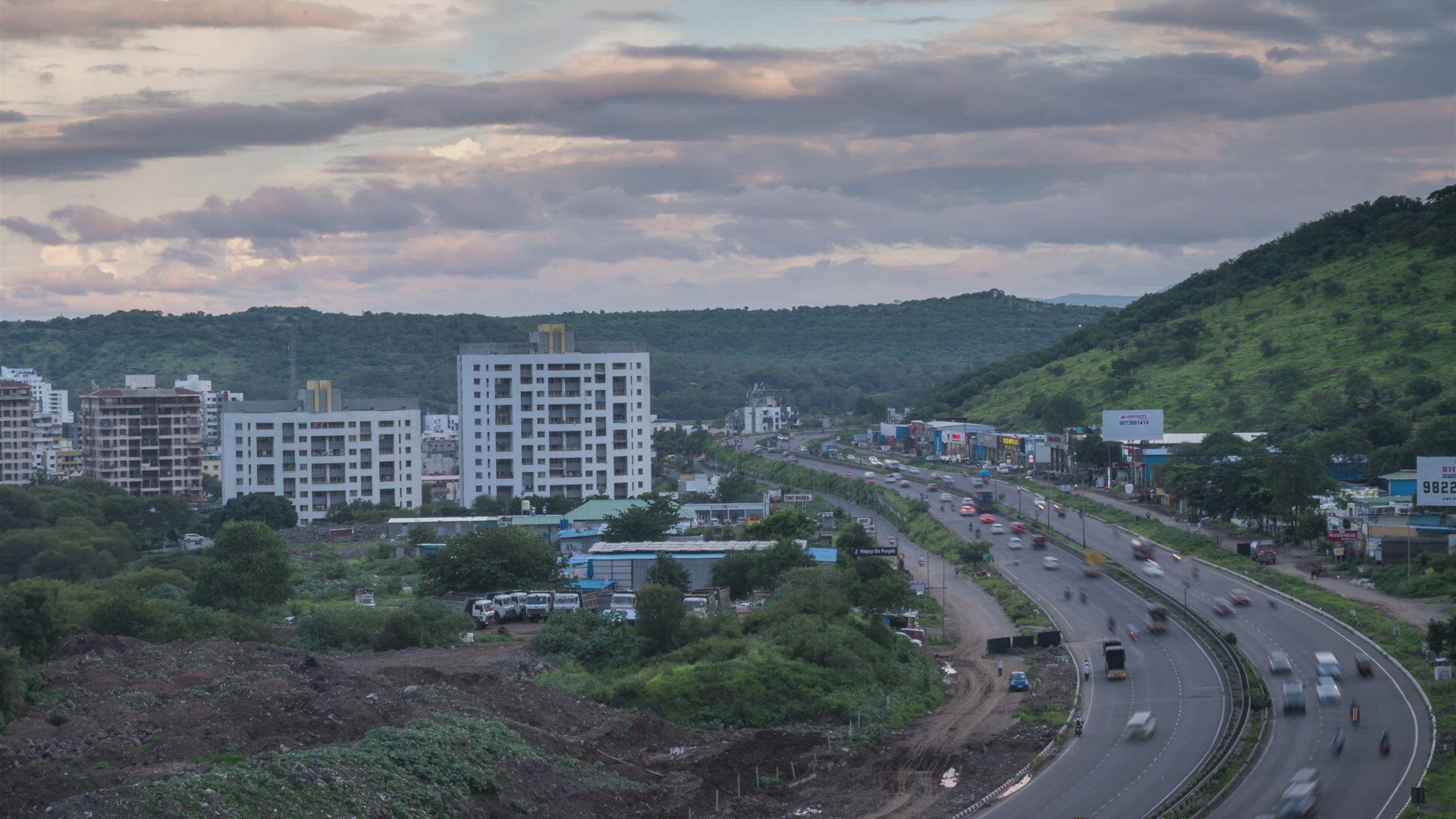 Time Lapse of Clouds Passing over Mountains &amp; Daytime Traffic on Mumbai-Pune National Highway, I
