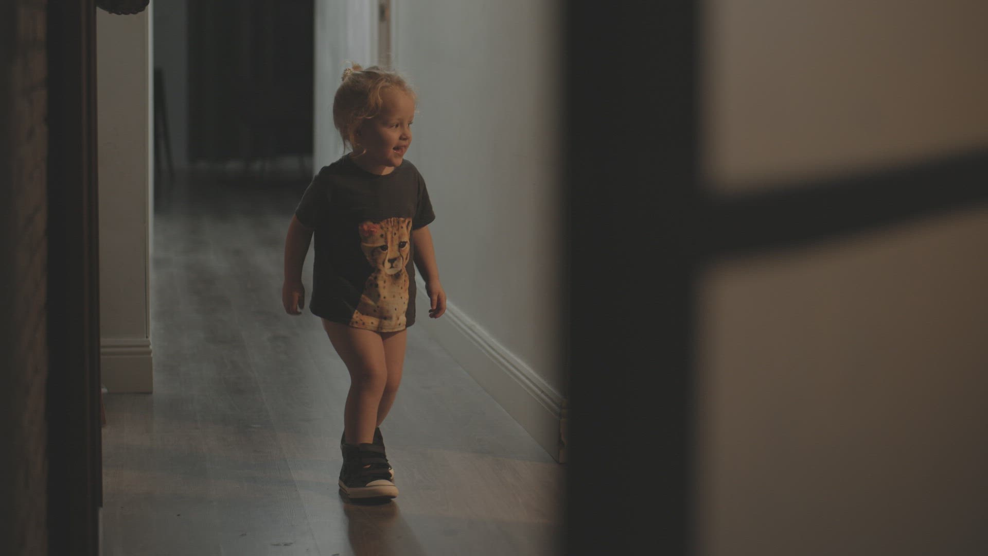 Little girl in big boots