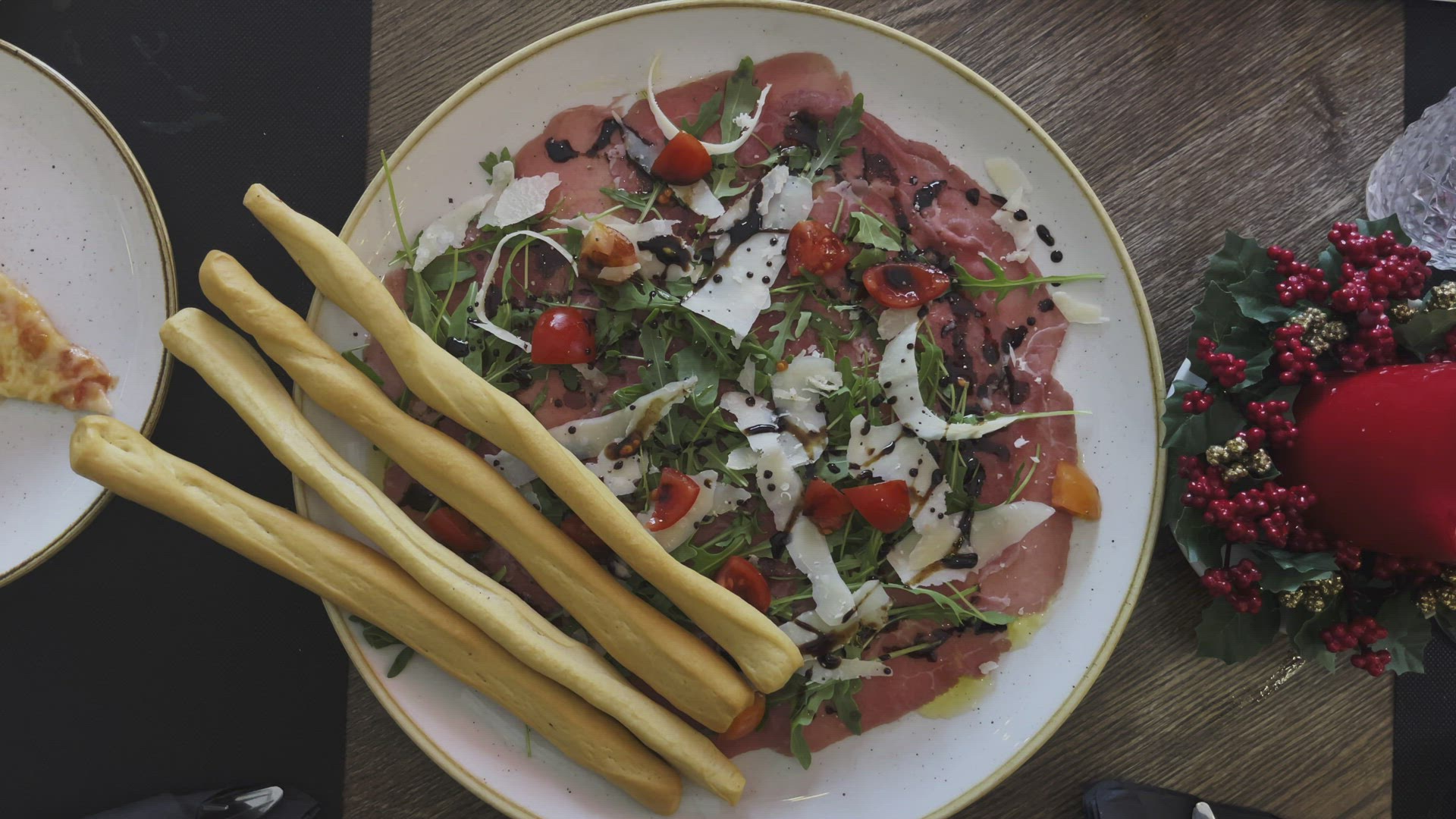 Delicious appetizer at restaurant with prosciutto