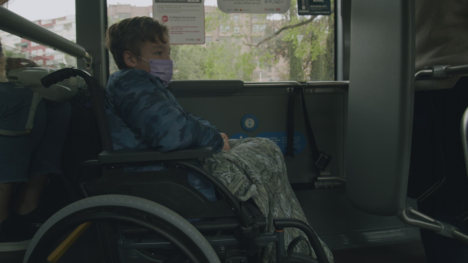 Disabled bus passenger in wheelchair