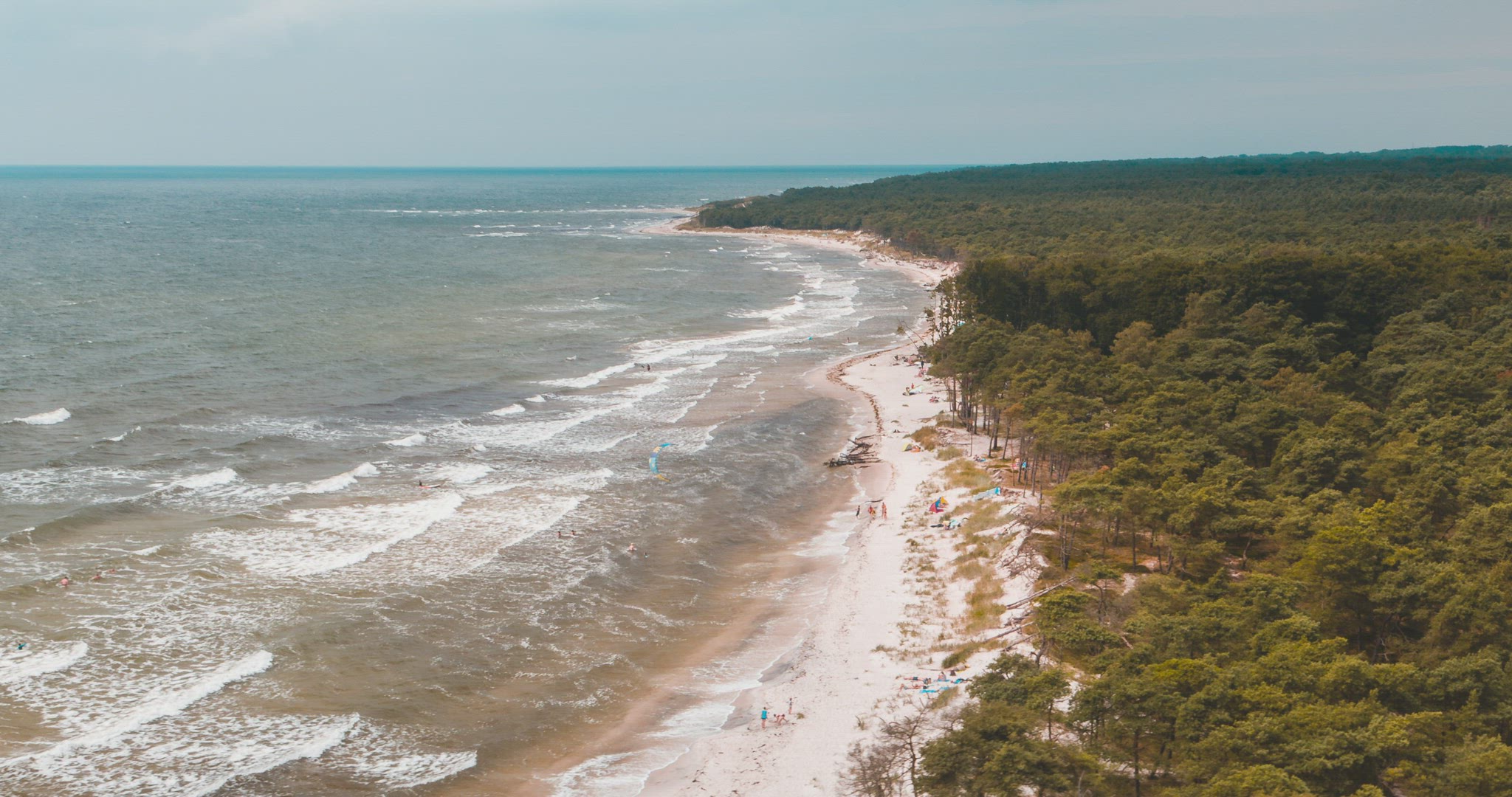 denmark bornholm beach coast forest kitesurfing waves travel aerial 4k