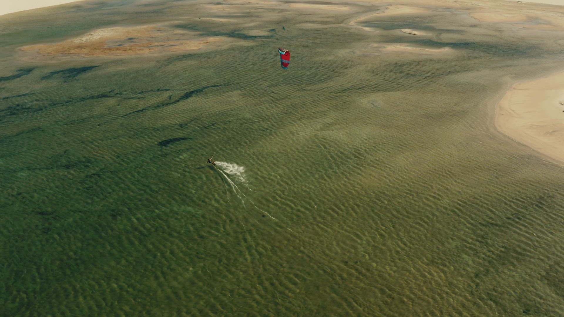 north brazil Lençóis Maranhenses kitesurfer lagoon dunes paradise desert water sports aerial topview