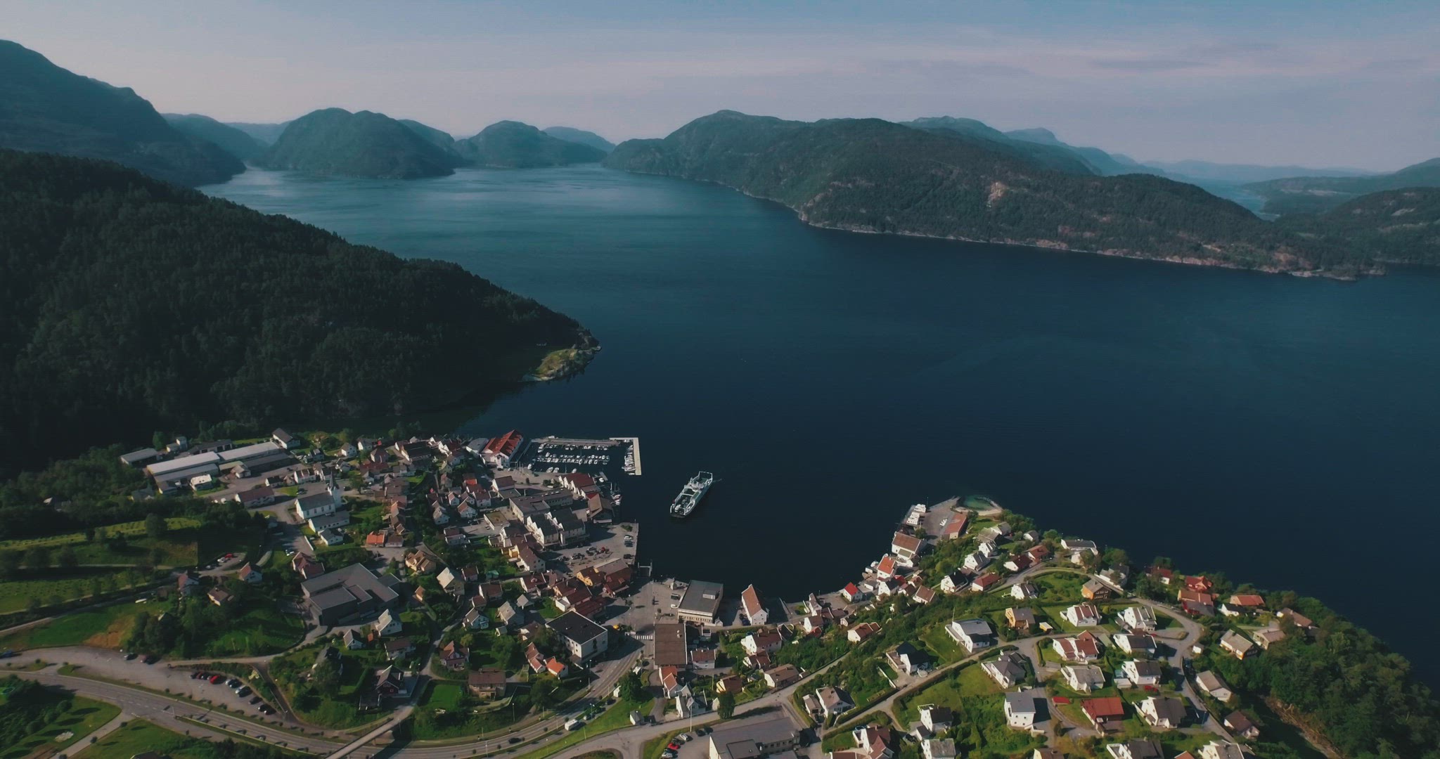 norway fjord aerial ferry harbour travel panorama mountains summer 4k