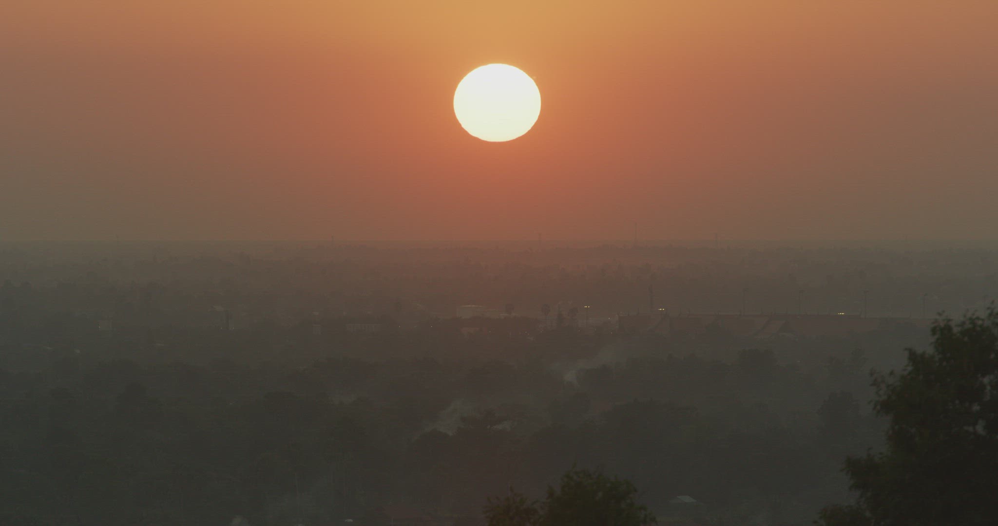 Cultural Site_Angkor Wat_setting sun over Siem Reip_Long static_0066.mov