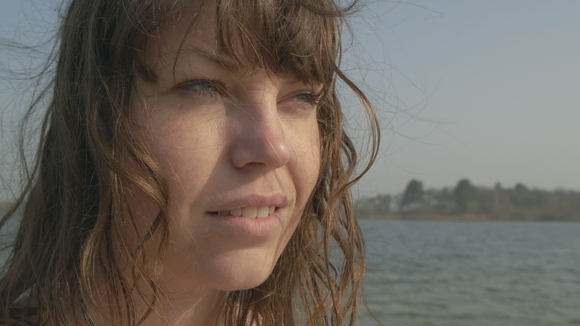 Woman with brown hair at lake, Breda, Netherlands