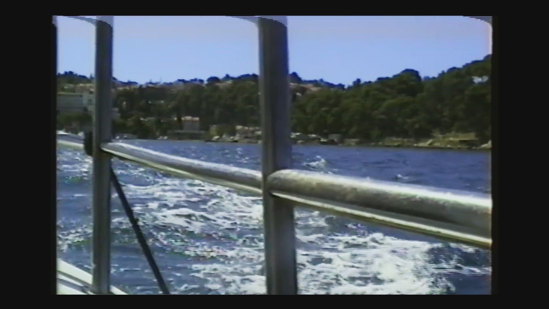 Sea waves crashing into side of sailing boat, Croatia