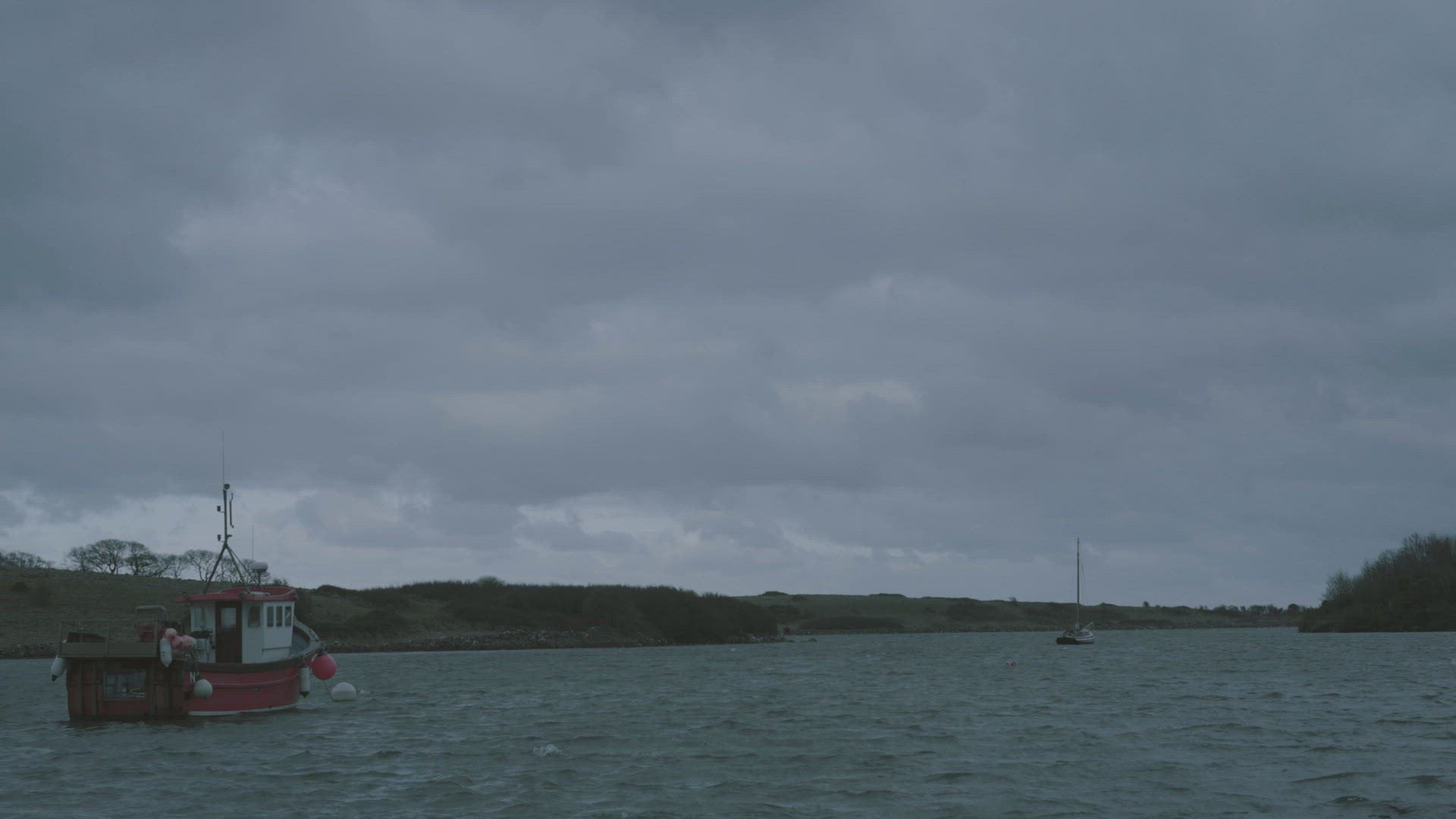 Fishing boat rotating in sea, Belfast, Northern Ireland