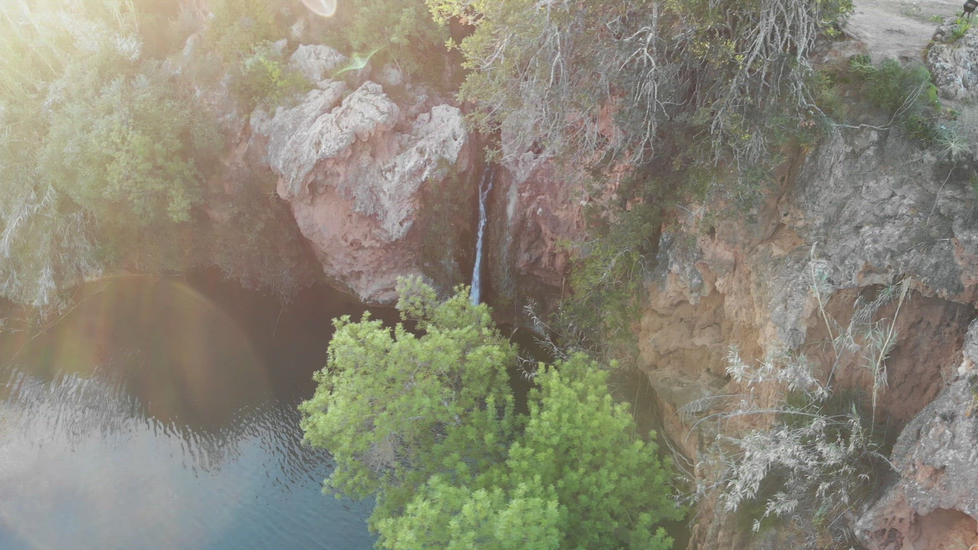 4k drone footage featuring the beautiful Pego Do Inferno waterfall in Portugal.