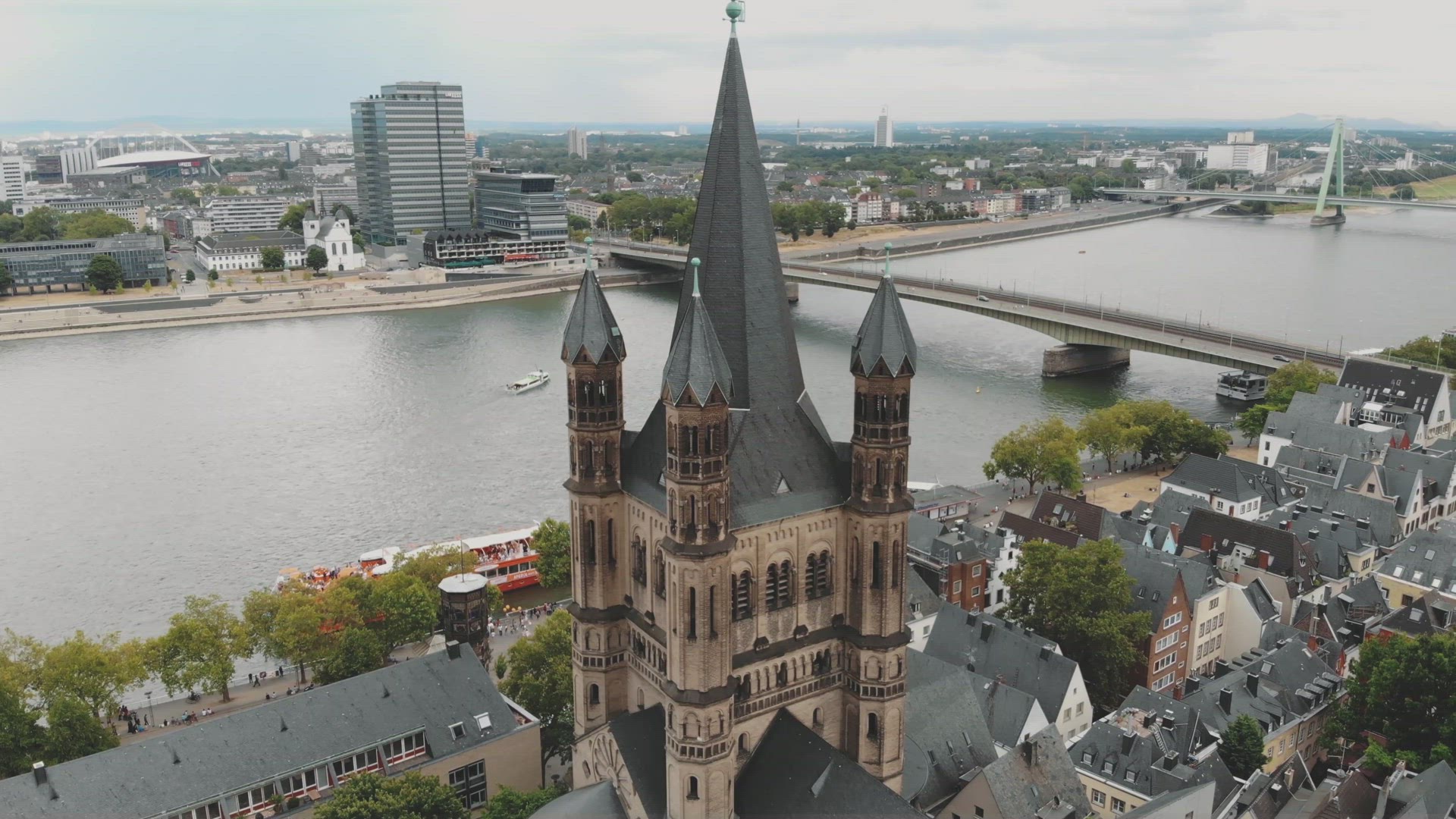 4k drone footage circling the historical Great Saint Martin Church of Cologne, Germany.	