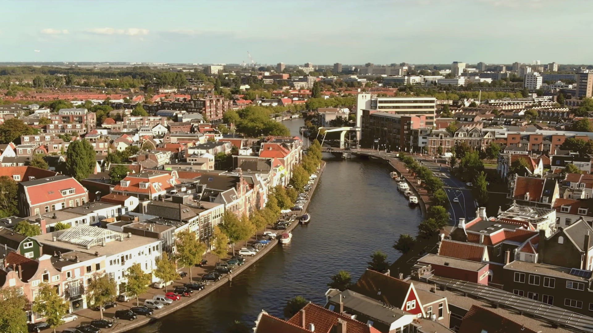Spaarne river, Haarlem, Netherlands. Aerial forward, high angle view of the city	