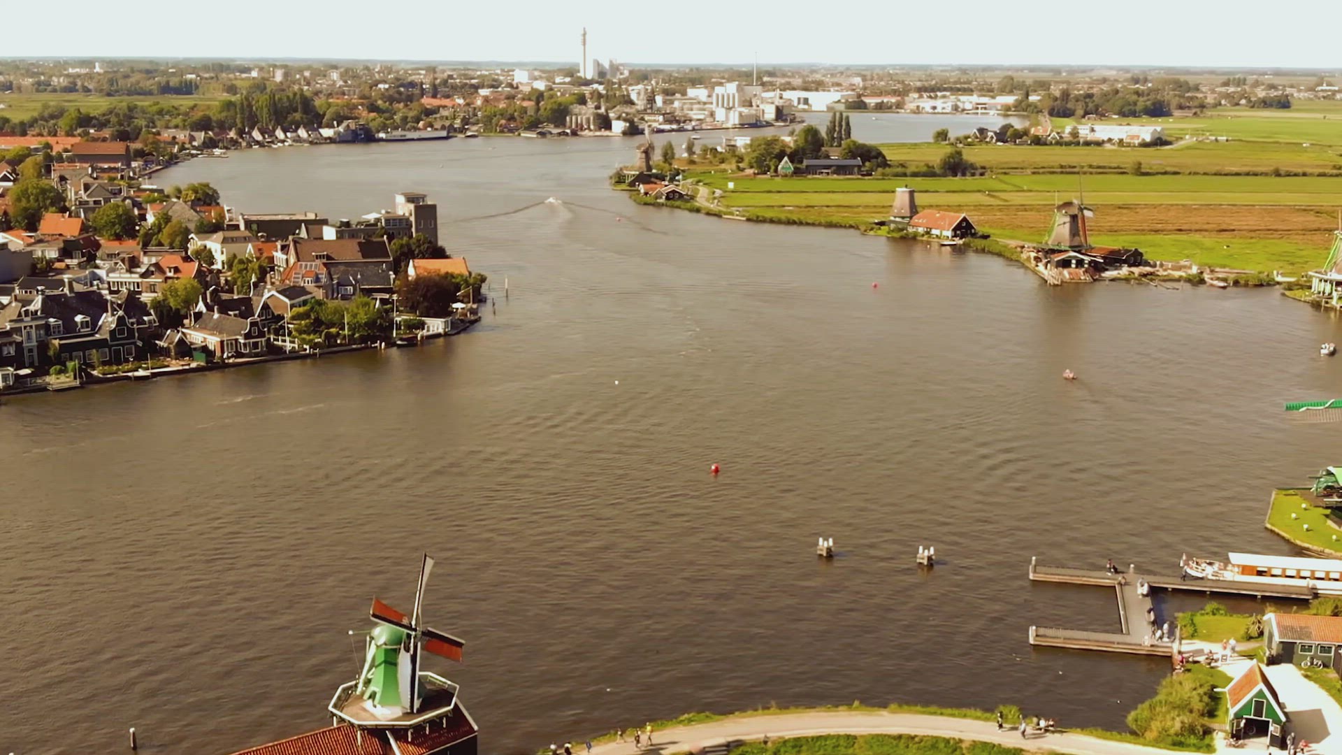 Fly-over River Zaan from Zaanse Schans to Zaandijk Town, Netherlands - Aerial	