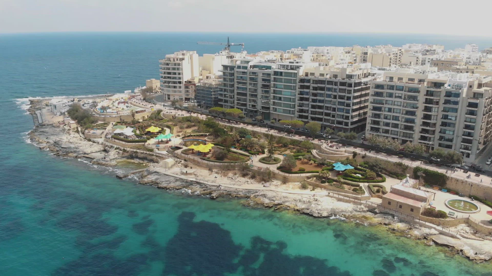 Aerial Clockwise Shot Of Exile Bay in Sliema Malta