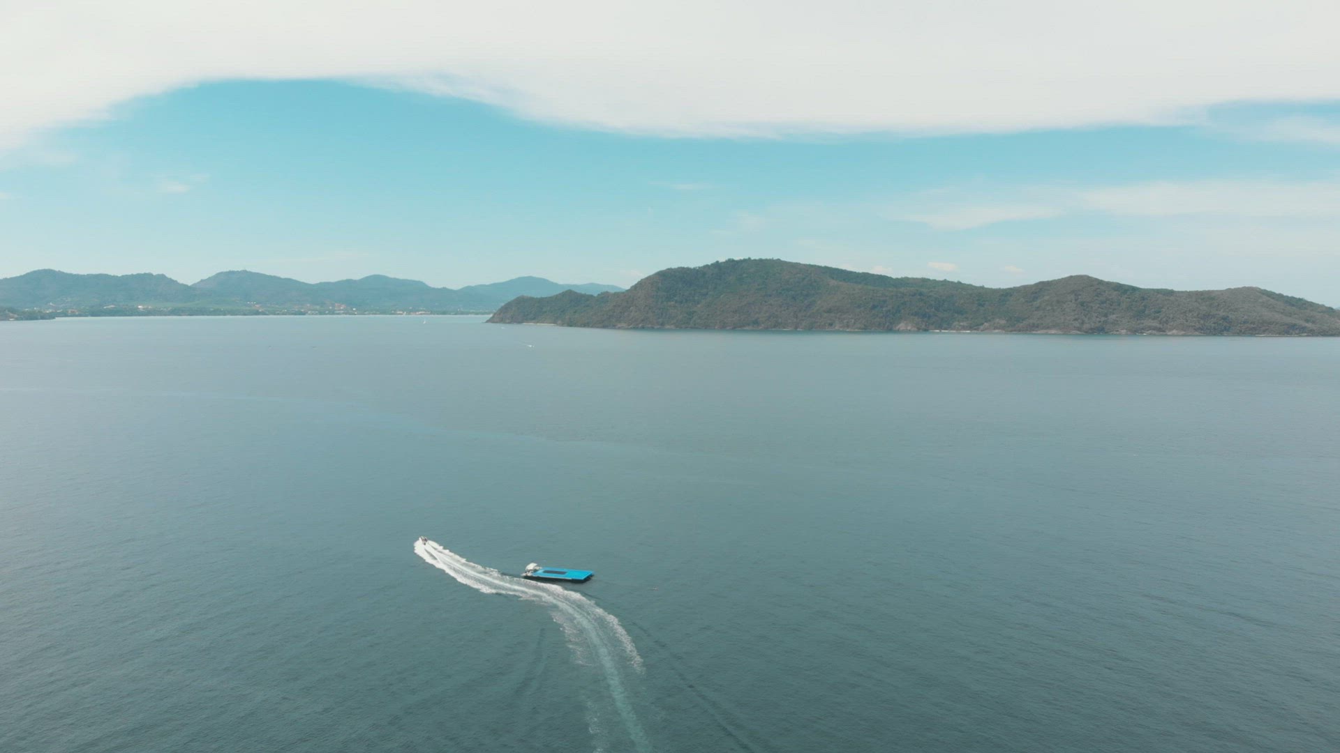 One motorboat roaring towards Coral Island, Thailand. Paradisiac tropical holidays