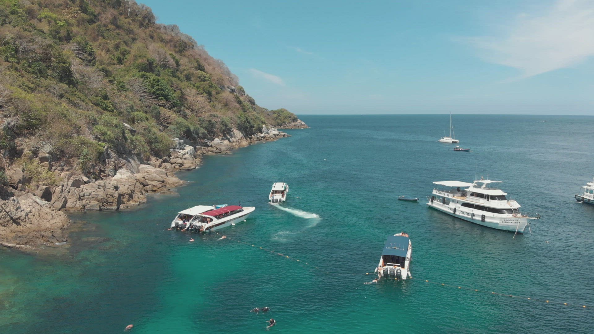 Motorboats moored off Koh Racha Yai island. Diving paradise holidays concept