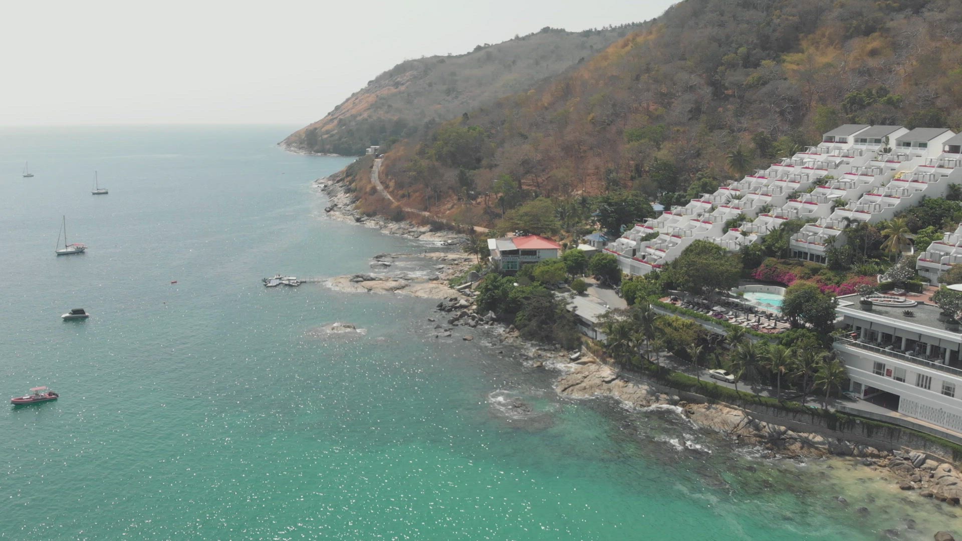 View over Nai harn Reef and beach luxury resort in the tropical landscape of Phuket, Thailand - Aeri