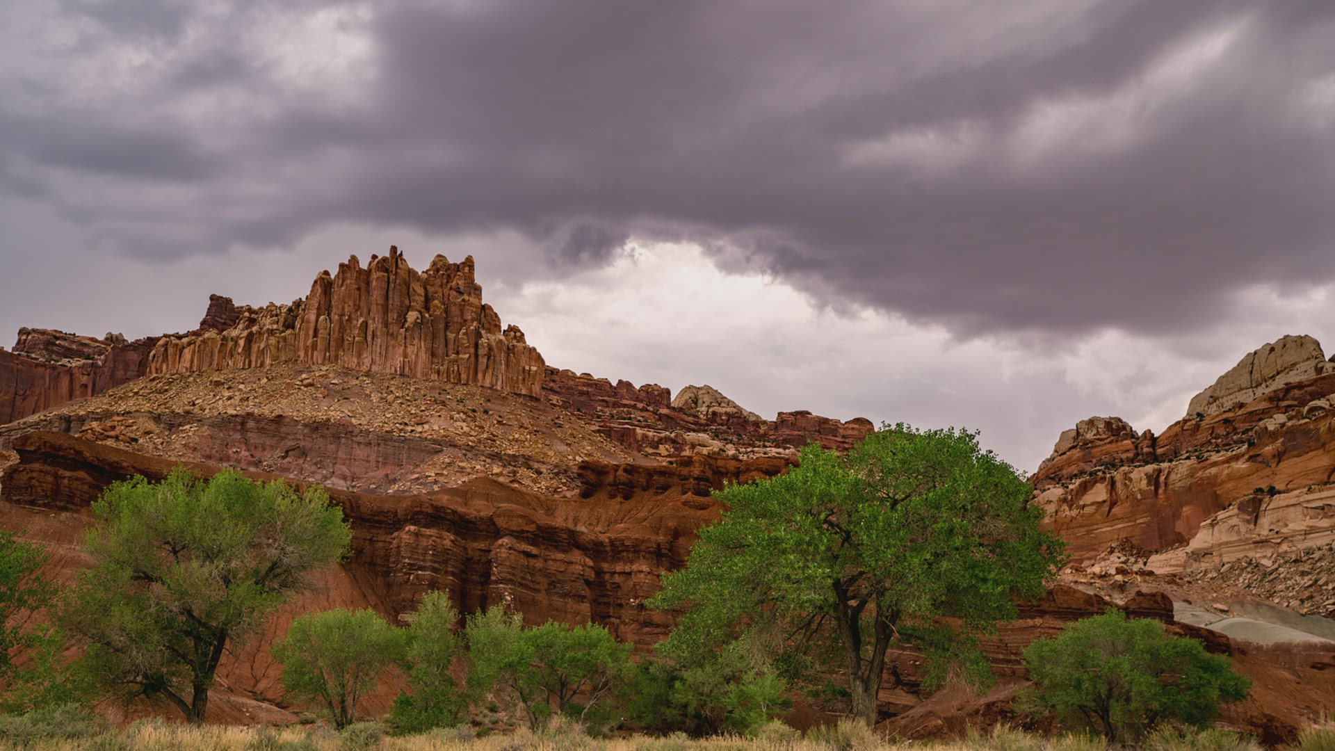 Timelapse of dramatic clouds moving over the cliffs in Capitol Reef