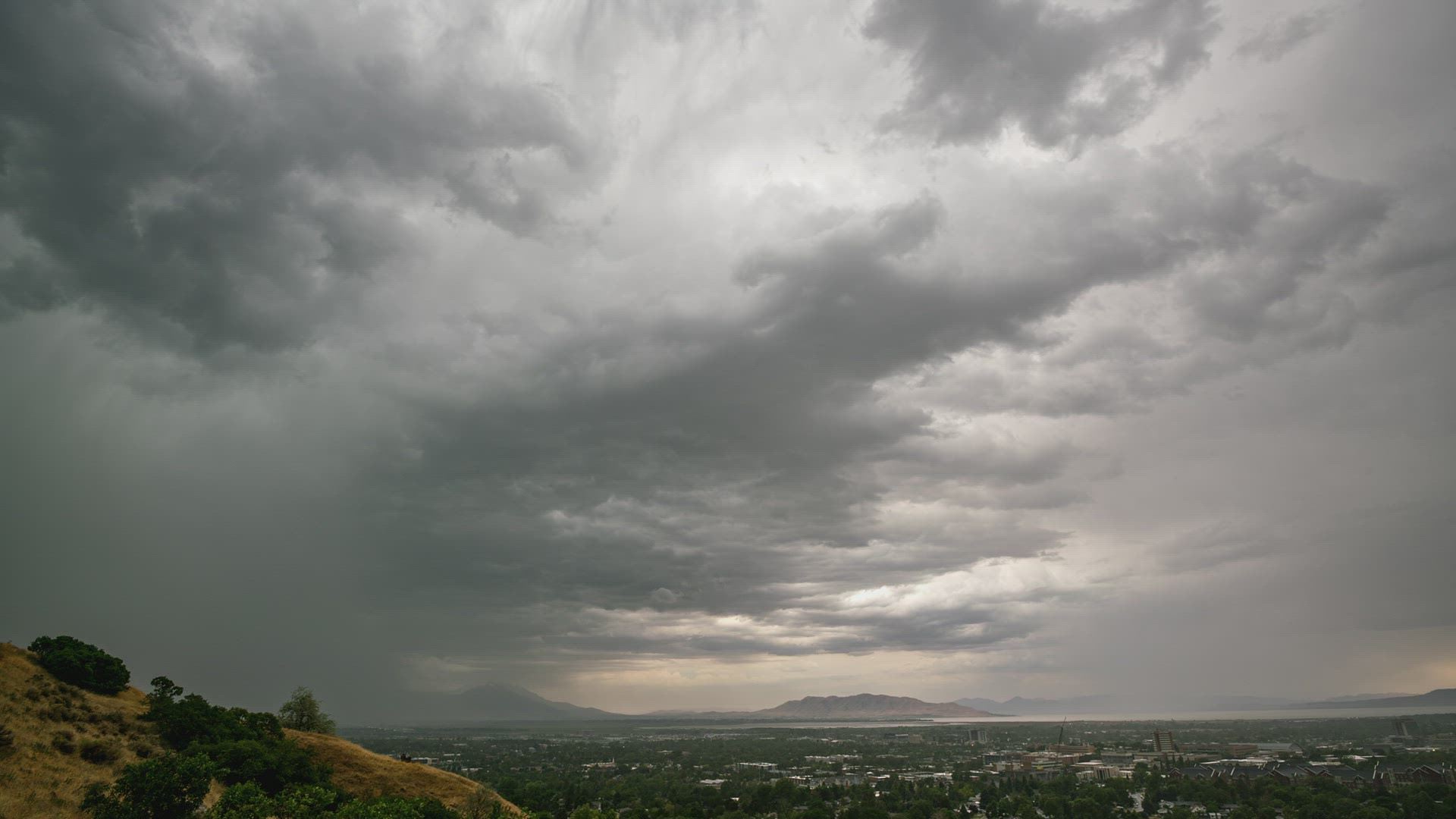 Rain storm over Provo City looking over the valley in timelapse